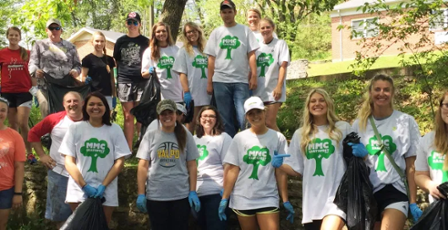 A large class of students doing a service-learning project for Earth Day at Martin Methodist University.