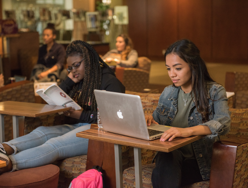 Two students in a study lounge at California State University, Dominguez Hills