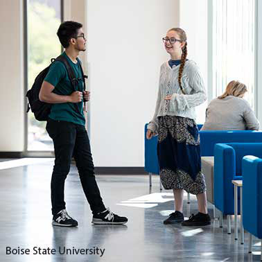 group of montanta state university students walking happily together.